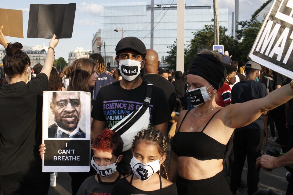 Several thousand people rallied peacefully for two hours around the main Paris courthouse. Source: AP