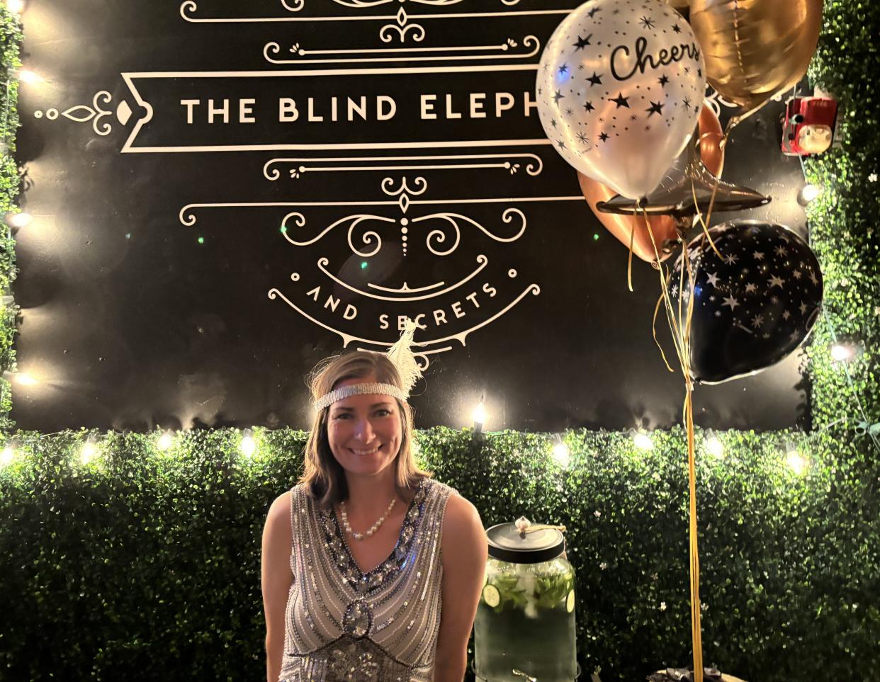 Ashley Tipper, owner of The Blind Elephant at 21 N. Front St. in downtown Wilmington, N.C., at the bar's 10th annual Great Gatsby Party on Jan. 19. 2024.