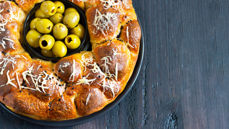 Pull-apart bread bowl with olives inside