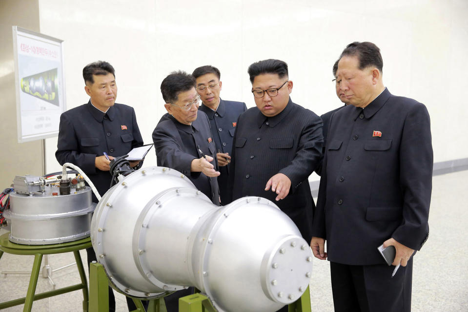 FILE - This undated file photo distributed on Sept. 3, 2017 by the North Korean government, shows North Korean leader Kim Jong Un, second from right, at an undisclosed location in North Korea. In recent weeks it’s become clear that Donald Trump wants to meet with Kim Jong Un again, and the North Korean leader has told the White House he’d like more face-to-face talks with the American president. (Korean Central News Agency/Korea News Service via AP, File)