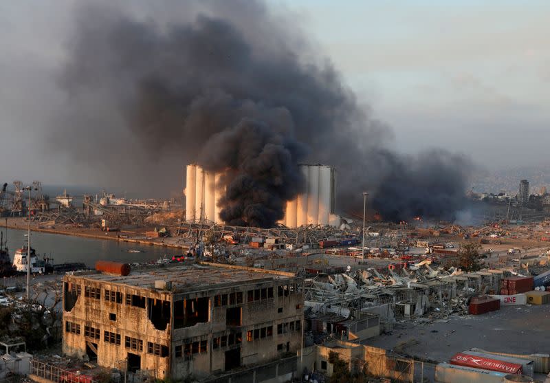 FILE PHOTO: Smoke rises from the site of an explosion in Beirut's port area