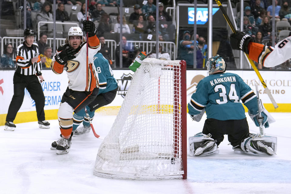 Anaheim Ducks left wing Max Comtois (44) celebrates a goal against San Jose Sharks goaltender Kaapo Kahkonen (34) during the second period in an NHL hockey game Tuesday, April 26, 2022, in San Jose, Calif. (AP Photo/Tony Avelar)