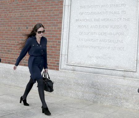 Lorraine Drumm, wife of Former Anglo Irish Bank CEO David Drumm, leaves federal court in Boston, Massachusetts October 13, 2015. REUTERS/Mary Schwalm