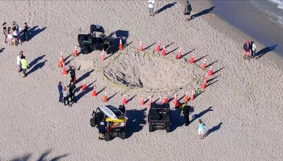 PHOTO: The sand hole 7-year-old Sloan Mattingly fell into on Lauderdale-by-the-Sea Beach. (WPLG)
