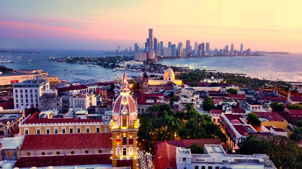 Aerial shot of Cartagena, Colombia at sunset showing the old and new city