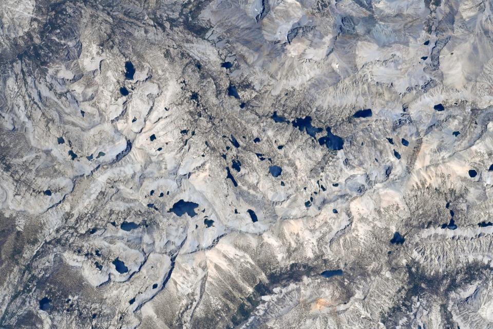 Sequoia and Kings Canyon National Parks granite grey mountains peppered with blue alpine lakes