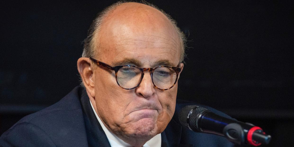 Rudy Giuliani frowns