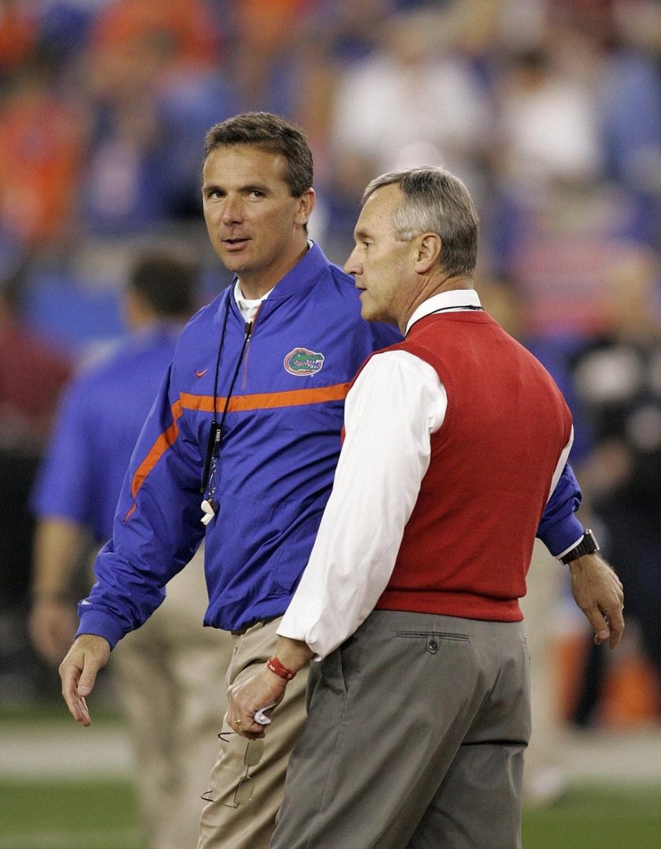 Ohio State coach Jim Tressel and Florida coach Urban Meyer meet before the the BCS championship game in 2007.