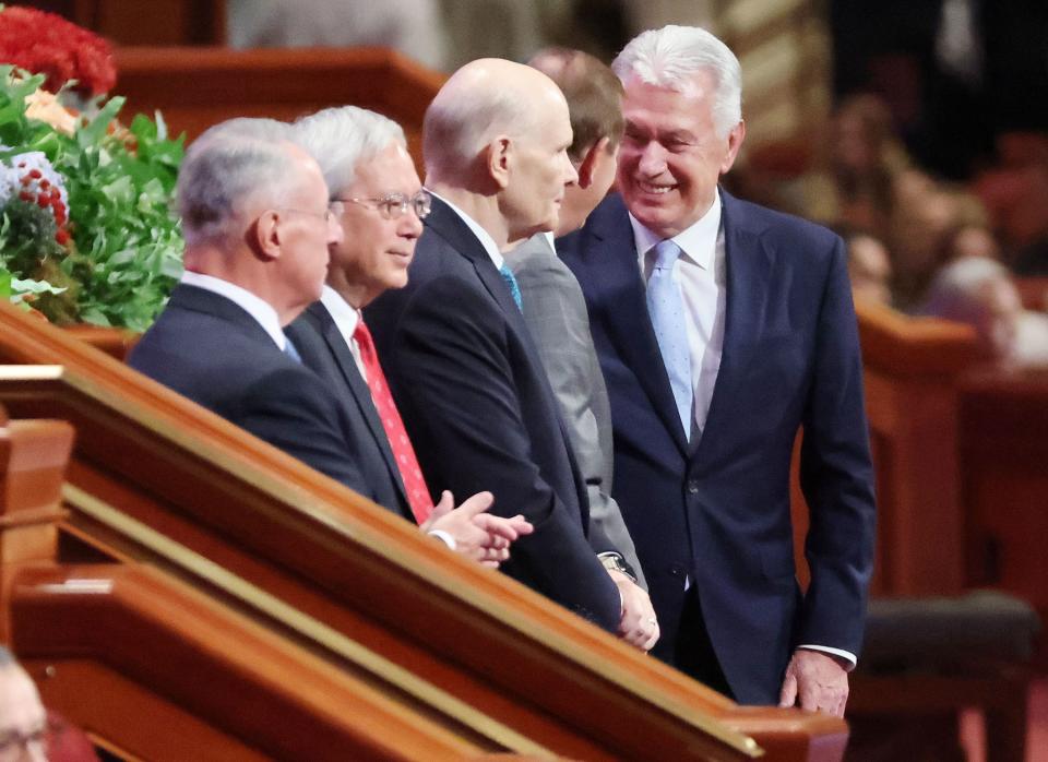 Elder Dieter F. Uchtdorf, of The Church of Jesus Christ of Latter-day Saints’ Quorum of the Twelve Apostles, right, talks with fellow apostles prior to the193rd Semiannual General Conference of The Church of Jesus Christ of Latter-day Saints at the Conference Center in Salt Lake City on Saturday, Sept. 30, 2023. | Jeffrey D. Allred, Deseret News