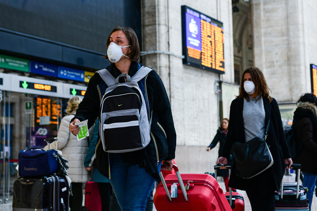 Milan, Italy - 25 February 2020: Passengers at Milano Centrale Train Station wear protective respiratory masks as restrictive measures are taken to contain the outbreak of Coronavirus COVID-19 (Photo by Piero Cruciatti/Sipa USA)