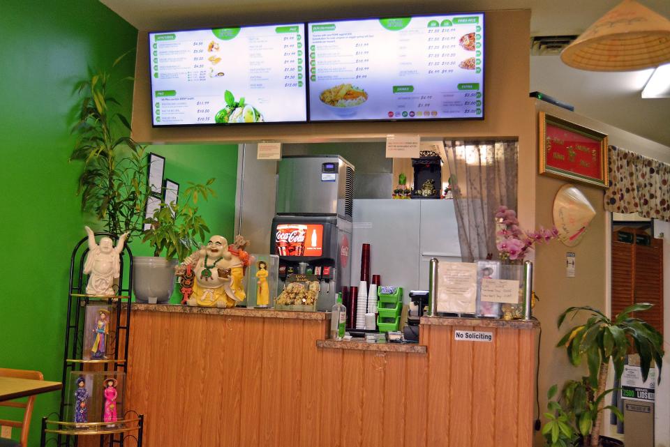 The counter and menu boards at Pho Quan Viet Cuisine on Vandiver Drive. The restaurant is moving locations to Paris Road in the old Hardee's building and will open there sometime in February.