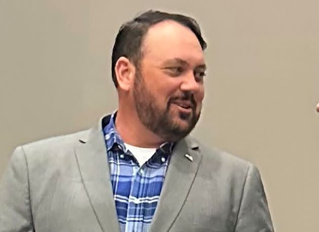 Judd Blevins, a city councilman in Enid, Oklahoma, speaks residents on March 26 before a community forum. Blevins, who has been connected with white nationalist groups, faces a recall vote.