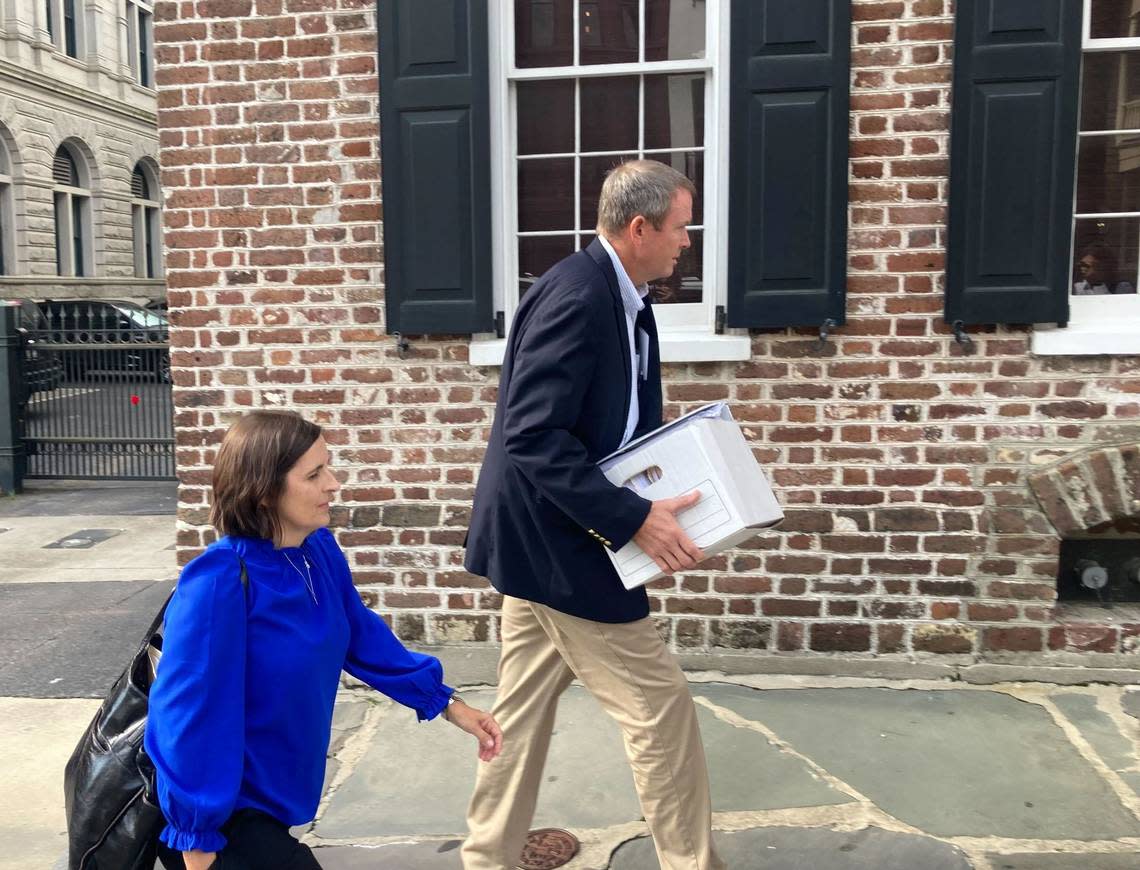 Russell Laffitte and his wife, Susie, arrive at the U.S. District Court in Charleston, South Carolina for his sentencing hearing on the morning of Aug. 1, 2023.