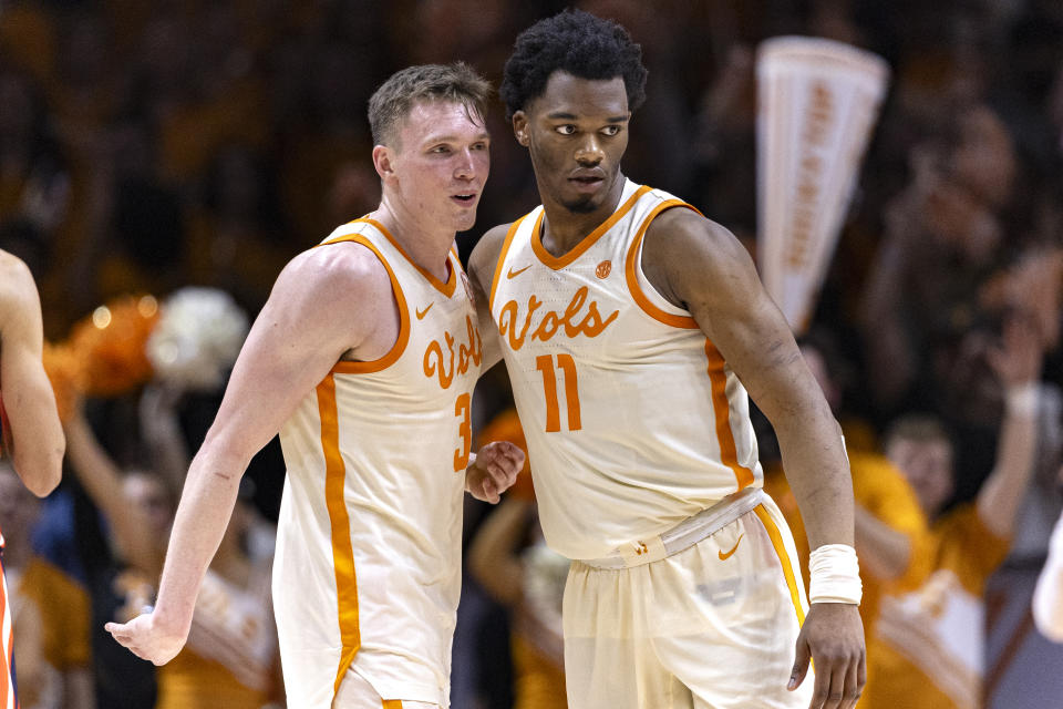 Tennessee guard Dalton Knecht (3) is congratulated by forward Tobe Awaka (11) after an NCAA college basketball game against Auburn, Wednesday, Feb. 28, 2024, in Knoxville, Tenn. (AP Photo/Wade Payne)