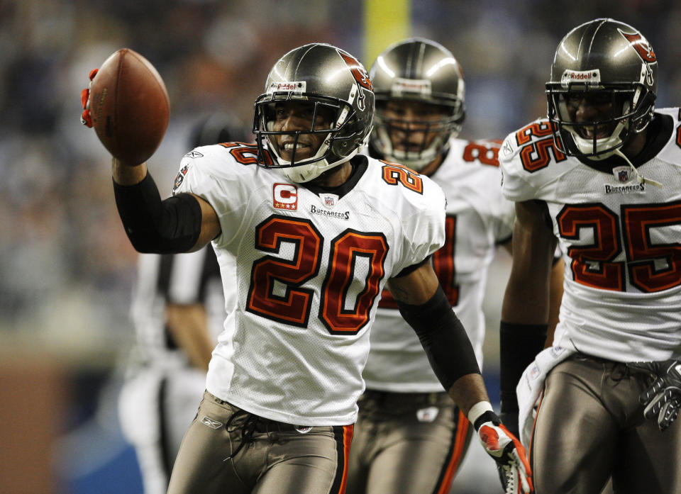 FILE - Tampa Bay Buccaneers cornerback Ronde Barber celebrates intercepting a pas by Detroit Lions' Daunte Culpepper in the second quarter of an NFL football game in Detroit, Nov. 23, 2008. Barber never doubted he’d wind up in the Pro Football Hall of Fame. The undersized cornerback’s journey included some of the most memorable plays in Tampa Bay Buccaneers history, as well as five trips to Canton in which he resisted the temptation to step foot in the building where he’ll be enshrined as part of a class of nine 2023 inductees. (AP Photo/Paul Sancya, File)