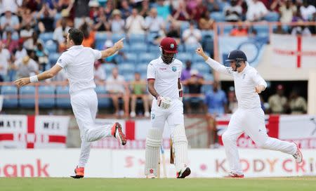 Cricket - West Indies v England - Second Test - National Cricket Ground, Grenada - 21/4/15 England's James Anderson celebrates the wicket of West Indies' Kraigg Brathwaite Action Images via Reuters / Jason O'Brien