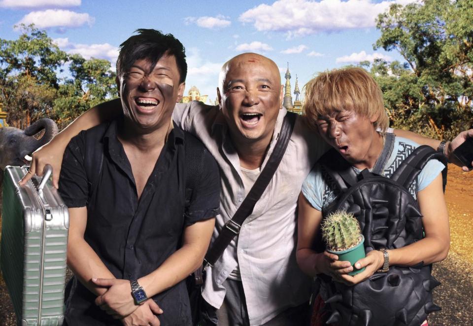 In this publicity image released by Pegasus Motion Pictures, "Lost in Thailand" stars, from left, Bo Huang, Xu Zheng, and Wang Baoqiang, pose together. Xu, the director, writer and star of China's biggest box-office hit, says "Lost in Thailand" succeeded by showing a rarely seen subject: modern Chinese life. The historical epic, fantasy, action and thriller genres have long filled China's domestic movie screens. But "Lost in Thailand" was a low-budget and light-hearted road-trip tale about an ambitious executive who goes to Thailand to get his boss's approval for a business deal. Along the way he's pursued by a rival co-worker and encounters a wacky tourist who helps him rethink his priorities. (AP Photo/Pegasus Motion Pictures)