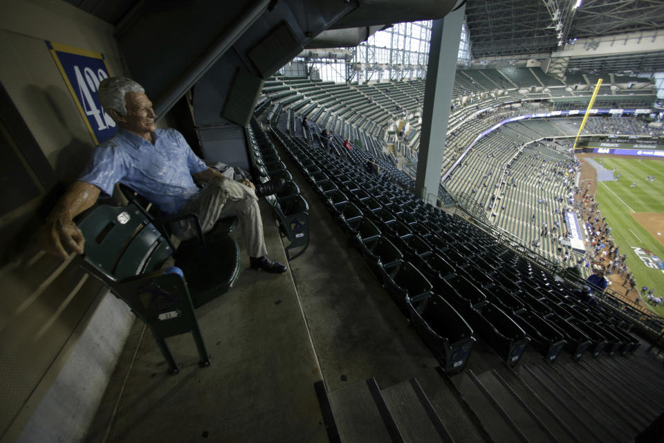 A figure of Milwaukee Brewers sportscaster Bob Uecker is seen in the stands before Game 1 of the National League Championship Series baseball game between the Milwaukee Brewers and the Los Angeles Dodgers Friday, Oct. 12, 2018, in Milwaukee. (AP Photo/Charlie Riedel)