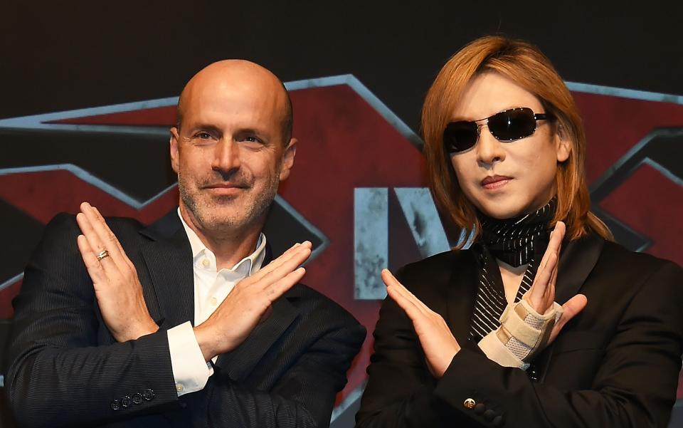 An ‘xXx 4’ press conference in Japan in 2019 with director D.J. Caruso (left) and Yoshiki (right), a Japanese rock star who regularly hung out with Kenny Huang