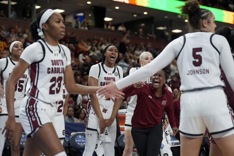 South Carolina celebrates after a blocked shot against Texas A&M during the first half of an NCAA college basketball game at the Southeastern Conference women's tournament Friday, March 8, 2024, in Greenville, S.C. (AP Photo/Chris Carlson)