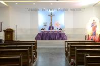 A Catholic priest celebrates a private mass at Saint Joseph's Church, due to the closure of all church services during a one-day Janata (civil) curfew imposed amid concerns over the spread of the COVID-19 novel coronavirus, in Secunderabad, the twin city of Hyderabad, on March 22, 2020. (Photo by NOAH SEELAM / AFP) (Photo by NOAH SEELAM/AFP via Getty Images)