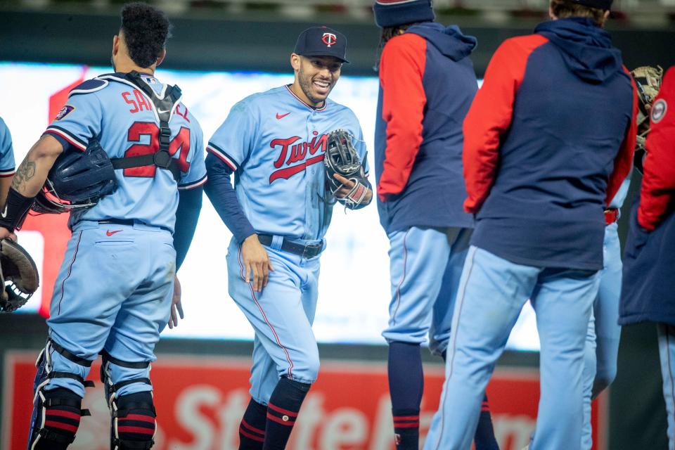 Minnesota Twins shortstop Carlos Correa celebrates victory over the Chicago White Sox in the ninth inning of a baseball game on Tuesday, Sept. 27, 2022, in Minneapolis. The Twins won 4-0.