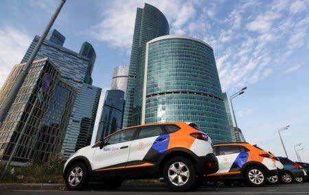Yandex.Drive carsharing cars are seen next to the Moscow City business centre in Moscow, Russia September 4, 2018. Picture taken September 4, 2018. REUTERS/Maxim Shemetov