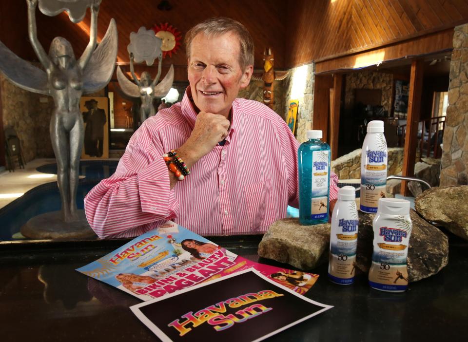 Ron Rice prepares for the inaugural beauty pageant for his sun care products company Havana Sun from his home in Ormond Beach, Fla.