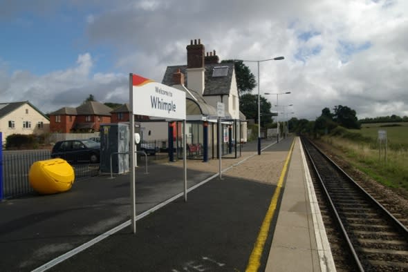 Angry passenger in ticket row stood in front of train to stop it