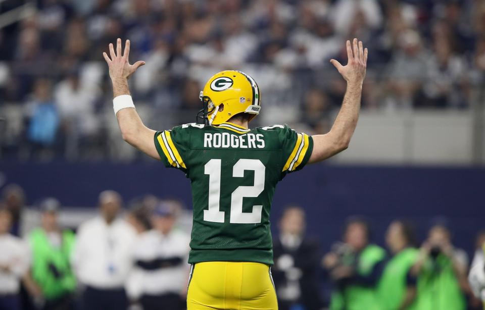 The Atlanta Falcons have a tough chore in trying to slow down the Green Bay Packers' Aaron Rodgers. (Getty Images)