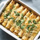 <p>These chicken enchiladas are great for using up any veggies you have lingering in your fridge. Our chicken enchilada recipe calls for zucchini, squash and onion, but you could easily swap in spinach, onions or potatoes.</p> <p> <a href="https://www.eatingwell.com/recipe/278420/25-minute-chicken-veggie-enchiladas/" rel="nofollow noopener" target="_blank" data-ylk="slk:View Recipe;elm:context_link;itc:0;sec:content-canvas" class="link ">View Recipe</a></p>