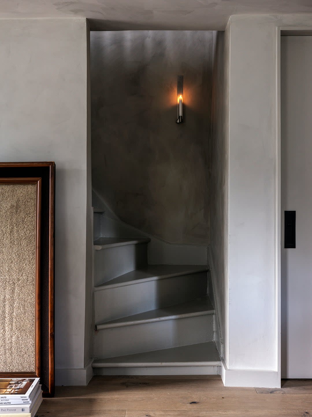 Narnia Who? This Cottage's Attic Doors Reveal a Dramatic Marble Shower photo