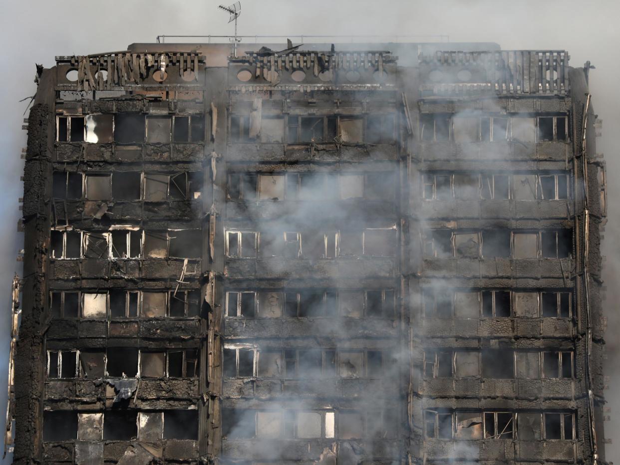 Smoke billows from the Grenfell Tower in Kensington, where 71 people were killed: Reuters