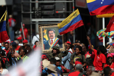 Supporters of Venezuela's President Nicolas Maduro take part in a rally in support of the government in Caracas, Venezuela May 20, 2019. REUTERS/Ivan Alvarado