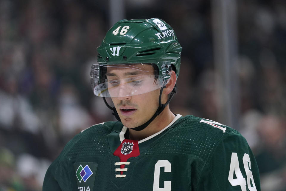 Minnesota Wild defenseman Jared Spurgeon pauses during the second period of the team's NHL hockey game against the New York Rangers, Thursday, Oct. 13, 2022, in St. Paul, Minn. (AP Photo/Abbie Parr)