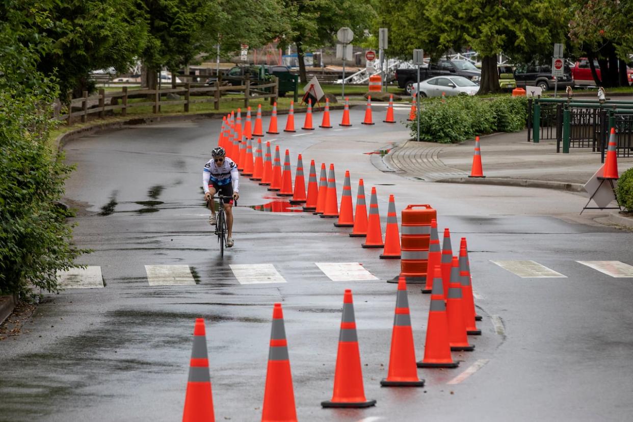 Part of the temporary Stanley Park bike lane as it looked in 2020. It was removed earlier in 2023, with the potential for a permanent lane that at this point lacks funding.  (Ben Nelms/CBC - image credit)