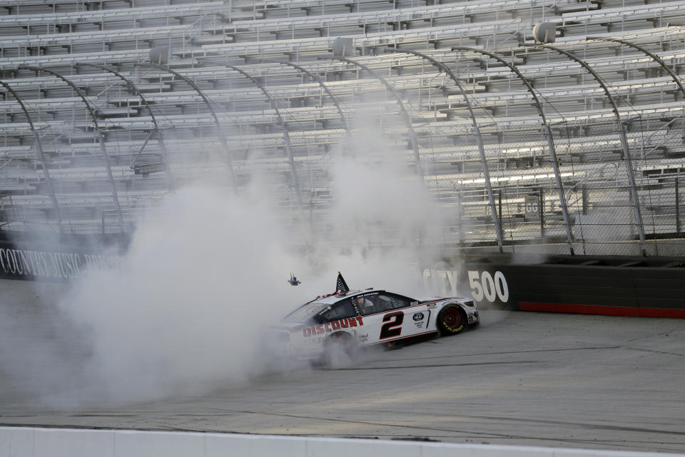 CORRECTS TO SUNDAY, MAY 31, 2020, NOT SATURDAY, MAY 30 - Brad Keselowski (2) does a burnout after winning after winning a NASCAR Cup Series auto race at Bristol Motor Speedway Sunday, May 31, 2020, in Bristol, Tenn. (AP Photo/Mark Humphrey)