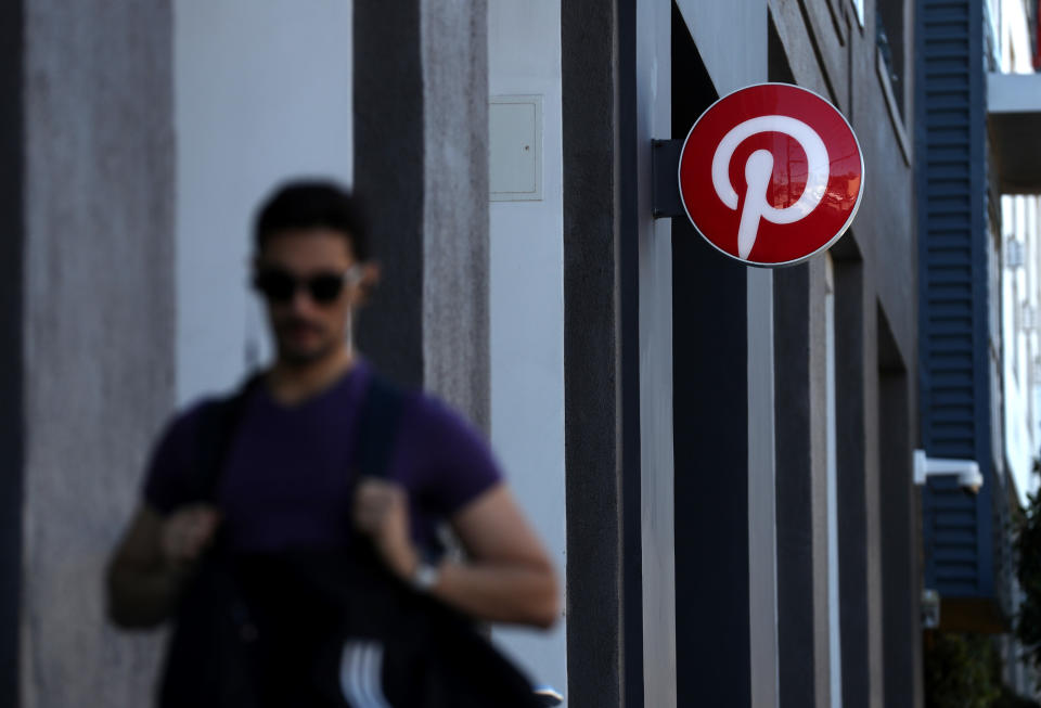 SAN FRANCISCO, CALIFORNIA - APRIL 09: A pedestrian walks by the Pinterest headquarters on April 09, 2019 in San Francisco, California. Social sharing site Pinterest is preparing for its initial public offering (IPO) and is planning to offer 75 million shares with a listing price of $15 to $17 per share. (Photo by Justin Sullivan/Getty Images)