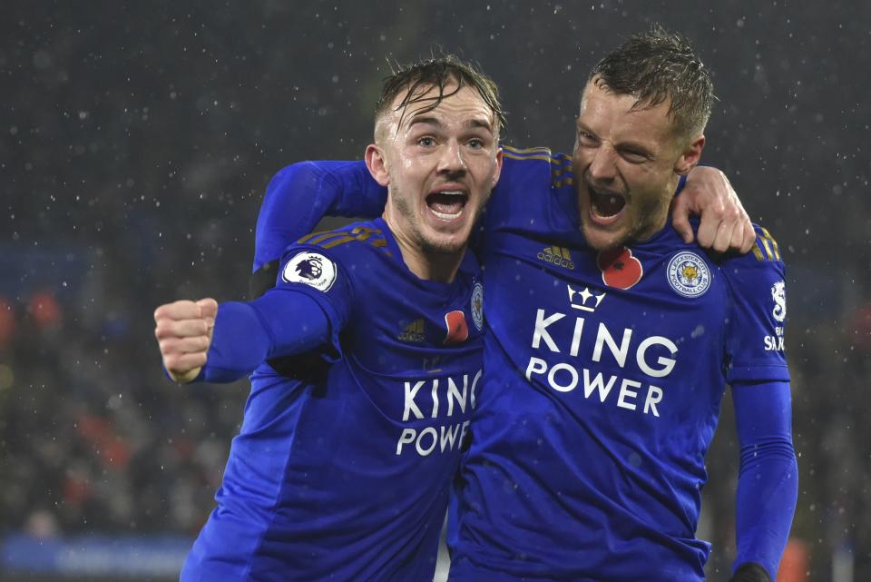 Leicester's James Maddison, left, celebrates with teammate Leicester's Jamie Vardy after scoring his side's second goal during the English Premier League soccer match between Leicester City and Arsenal at the King Power Stadium in Leicester, England, Saturday, Nov. 9, 2019. (AP Photo/Rui Vieira)