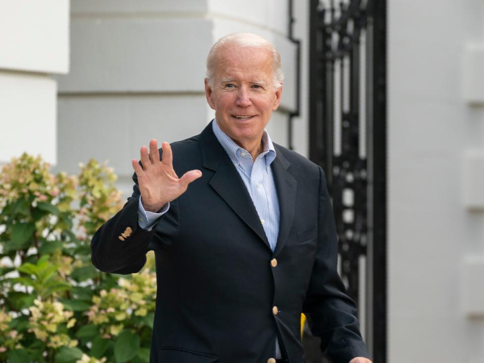 President Joe Biden waves as he walks to board Marine One on the South Lawn of the White House in Washington, on his way to his Rehoboth Beach, Del., home after his most recent COVID-19 isolation, Sunday, Aug. 7, 2022.