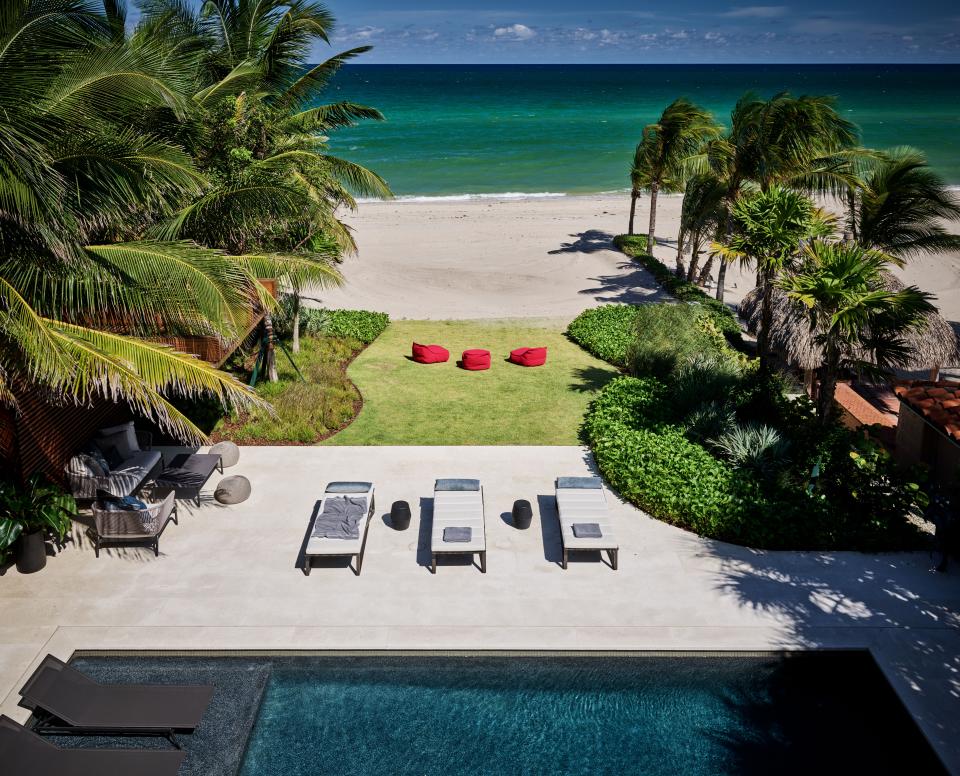 Golden Beach, the exclusive enclave where Joyner’s home sits, is famed for its seclusion. Homeowners have the rarity of private coastline, of which Joyner takes advantage with both a pool terrace and a manicured grass area that leads right to the sand. Enea Landscape Architecture designed all the outdoor space.