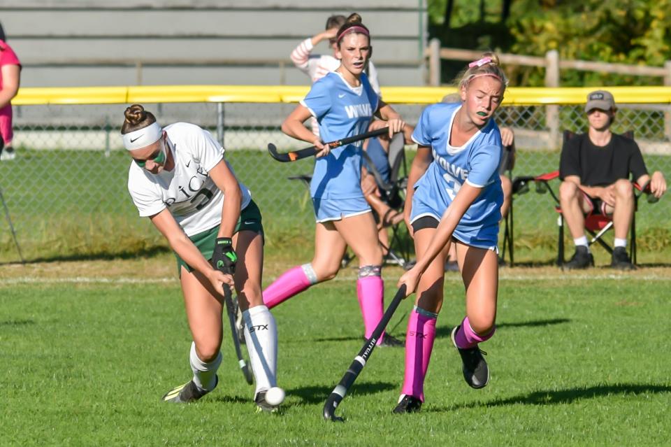 South Burlington's Rosa DiGuilian tries to block the drive of Rice's Violet Clough during the Wolves' 2-1 win over the Green Knights earlier this season at Rice.