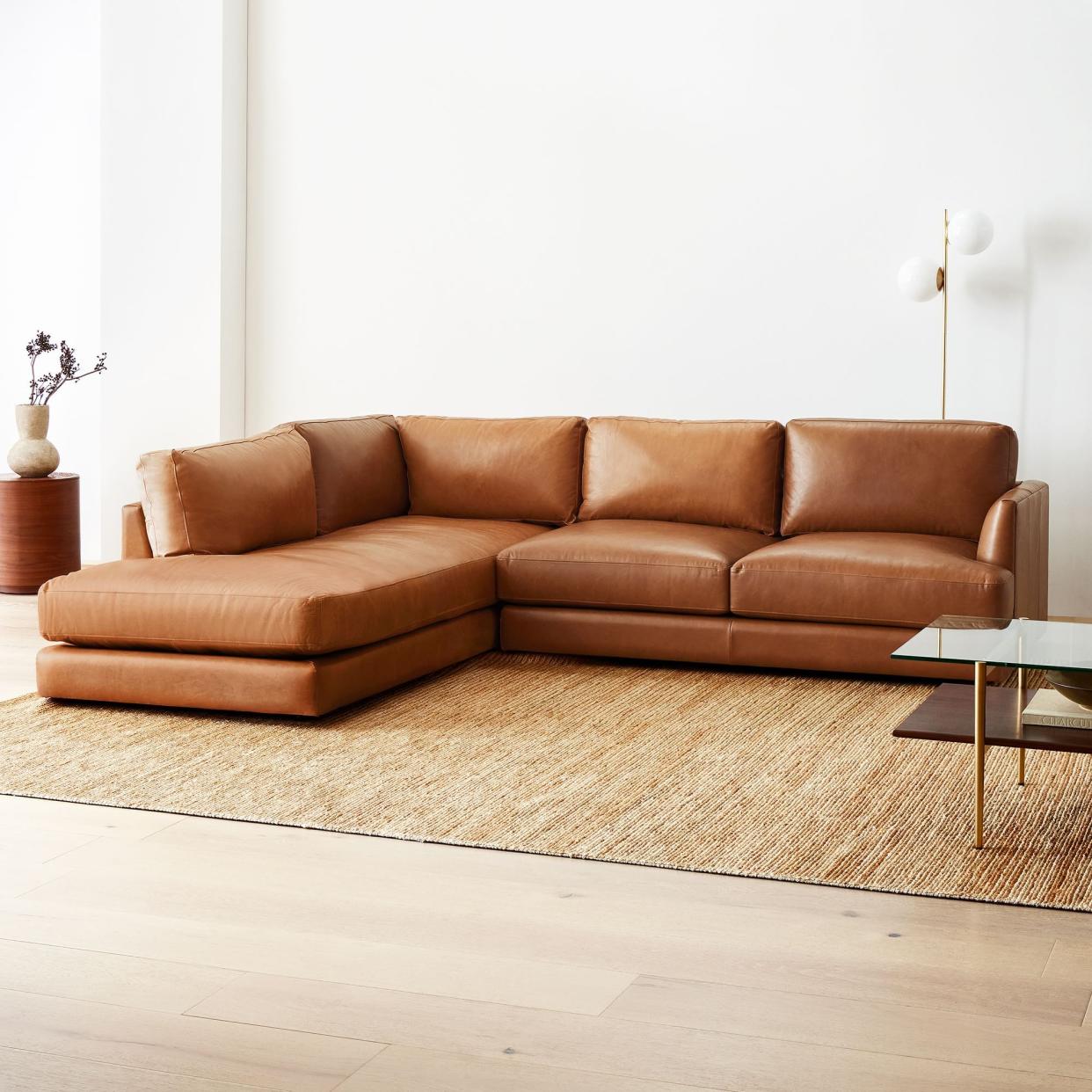 <p><a href="https://go.redirectingat.com?id=74968X1596630&url=https%3A%2F%2Fwww.westelm.com%2Fproducts%2Fhaven-leather-2-piece-terminal-chaise-sectional-h3517&sref=https%3A%2F%2Fwww.esquire.com%2Flifestyle%2Fg45419039%2Fbest-l-shaped-sofas%2F" rel="nofollow noopener" target="_blank" data-ylk="slk:Shop Now;elm:context_link;itc:0;sec:content-canvas" class="link rapid-noclick-resp">Shop Now</a></p><p>Haven Leather Sectional</p><p>westelm.com</p><p>$4238.00</p>