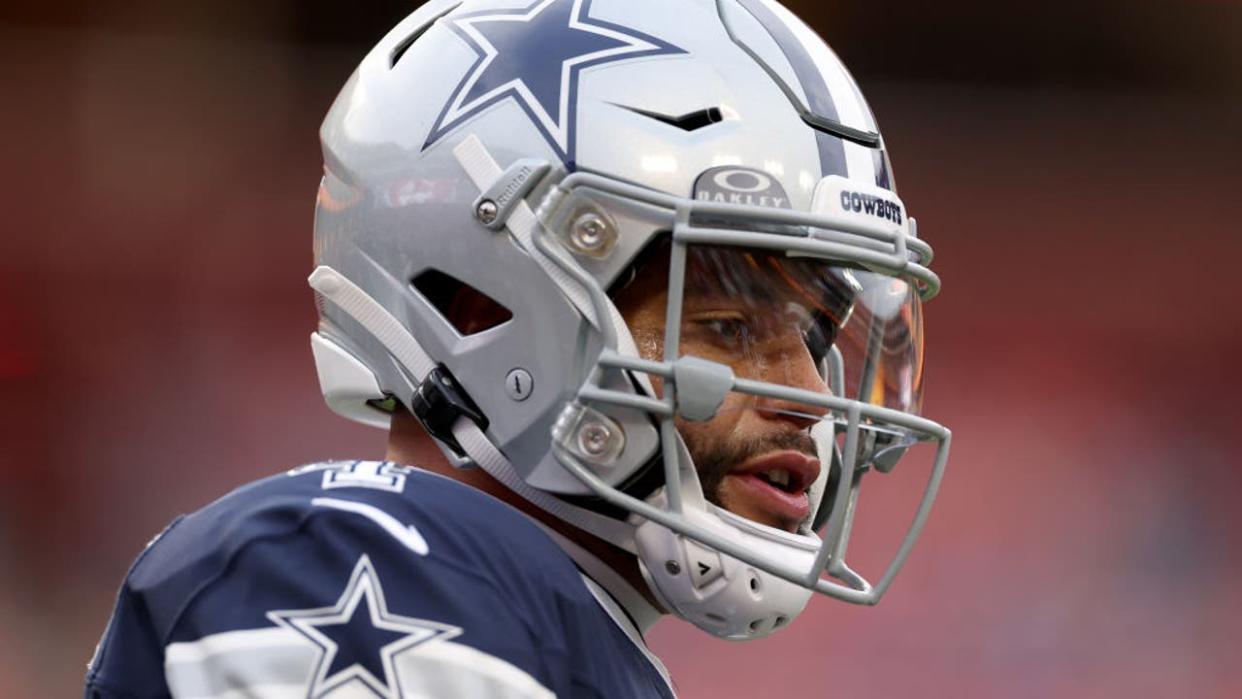 <div>LANDOVER, MARYLAND - JANUARY 07: Dak Prescott #4 of the Dallas Cowboys warms up before the game against the Washington Commanders at FedExField on January 07, 2024 in Landover, Maryland. (Photo by Patrick Smith/Getty Images)</div>