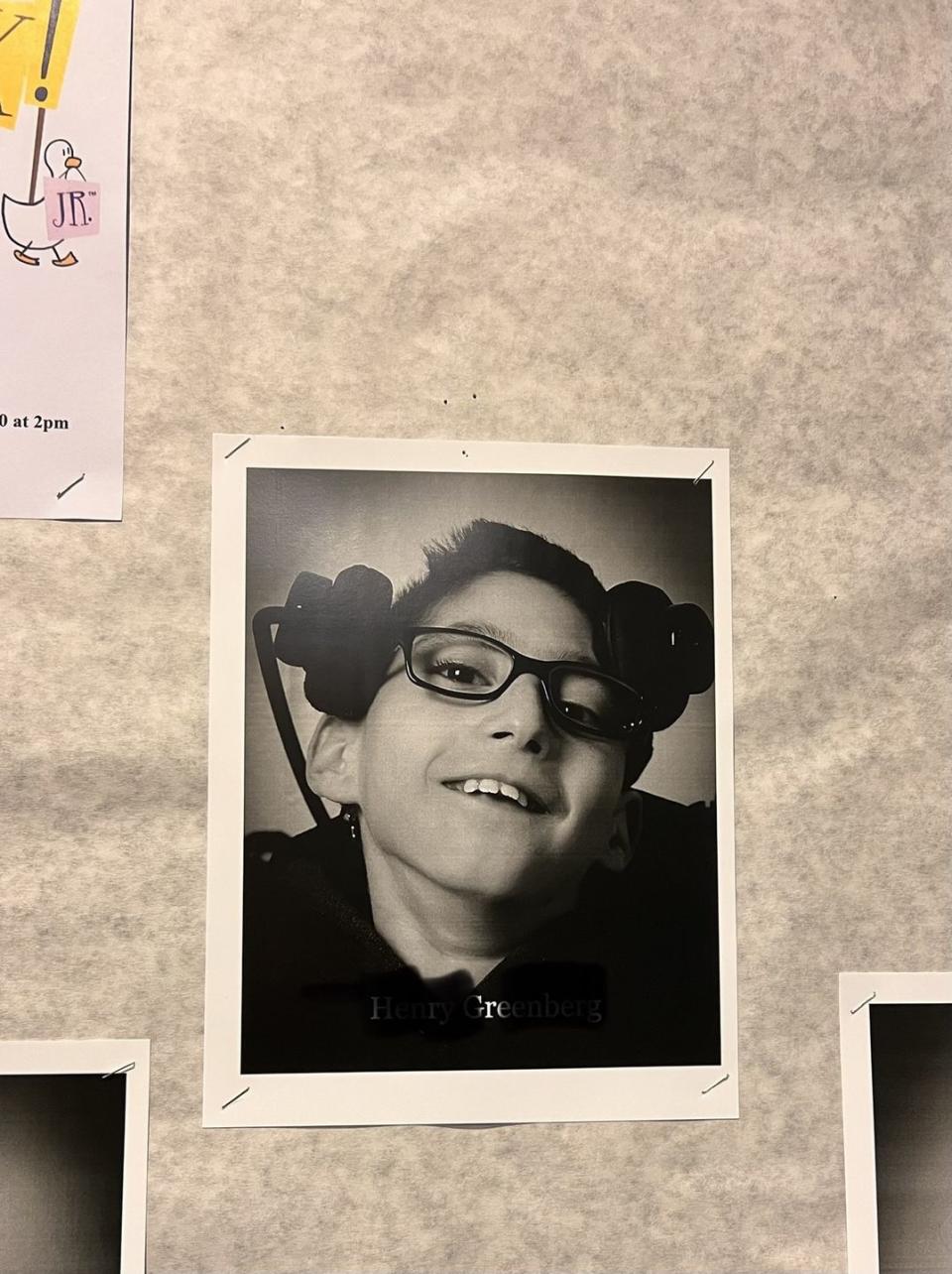 henry's cast head shot on the bulletin board