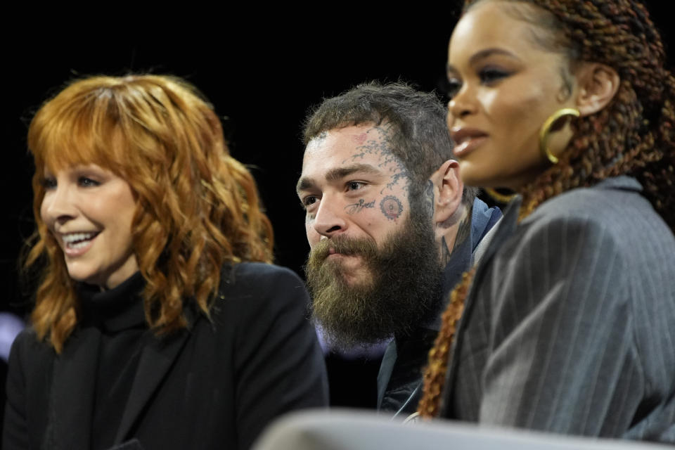 From left, Reba McEntire, Post Malone and Andra Day attend a news conference ahead of the Super Bowl 58 NFL football game Thursday, Feb. 8, 2024, in Las Vegas. (AP Photo/John Locher)