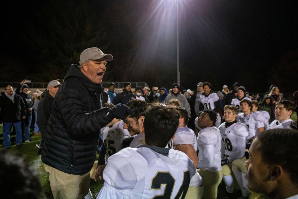 Sacred Heart-Griffin head football coach Ken Leonard celebrates with his team after the Cyclones defeated Rochester in the IHSA Class 4A semifinals at Rocket Booster Stadium in Rochester, Ill., Friday, November 19, 2021. [Justin L. Fowler/The State Journal-Register] 