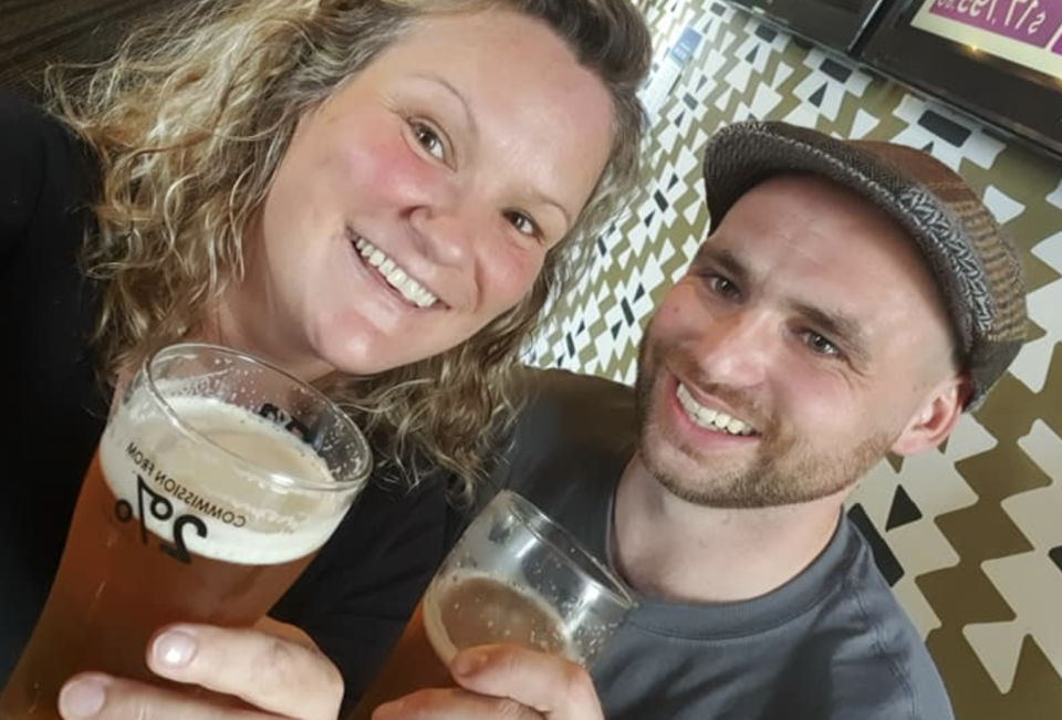 Connor Reed, right, is seen holding a beer while smiling with his mum, Hayley.