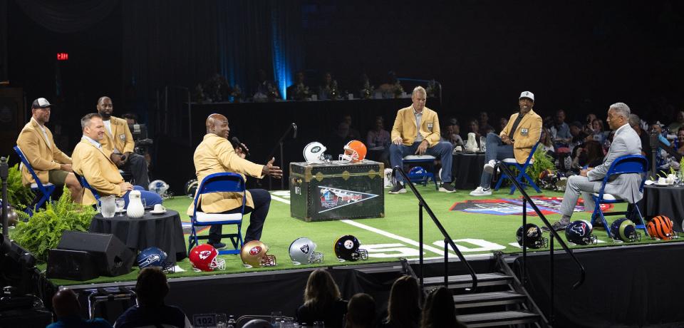 Class of 2023 Hall of Famers DeMarcus Ware (center), Zach Thomas (to left), Joe Thomas, Darrelle Revis, Joe Klecko, Rondé Barber join NFL Network's Steve Wyche at the Enshrinees’ Roundtable on Sunday.
