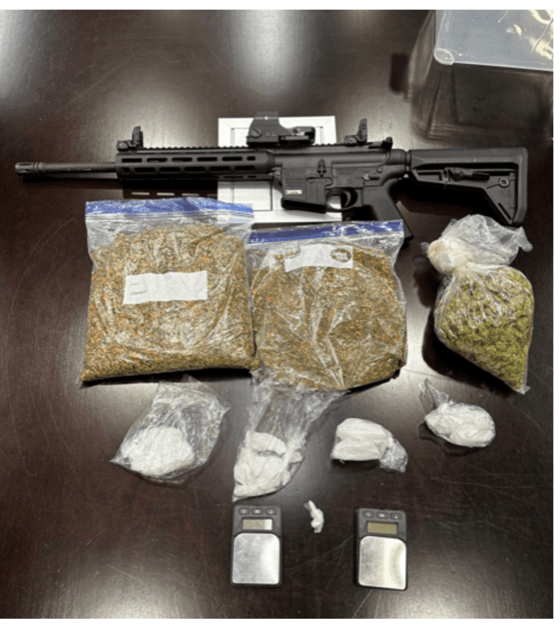 Photo of drugs, paraphernalia and gun seized during search warrant (MCSO)